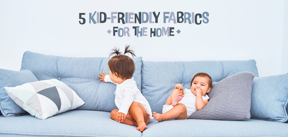 Two Babies Sitting on Sofa