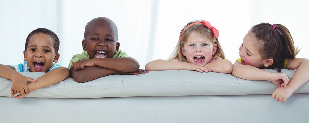 Kids Sitting on Kid-Friendly Fabric