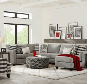 Grey Fusion Furniture sectional with accent chair and ottoman