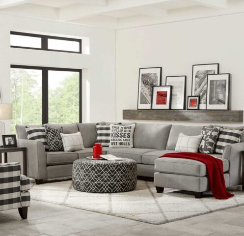 Grey Fusion Furniture sectional with accent chair and ottoman