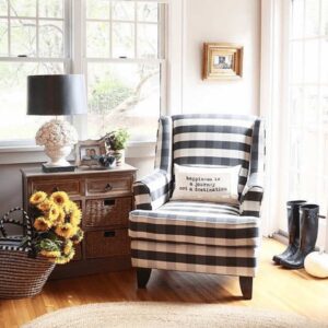 Checkered Fusion Furniture chair with throw pillow