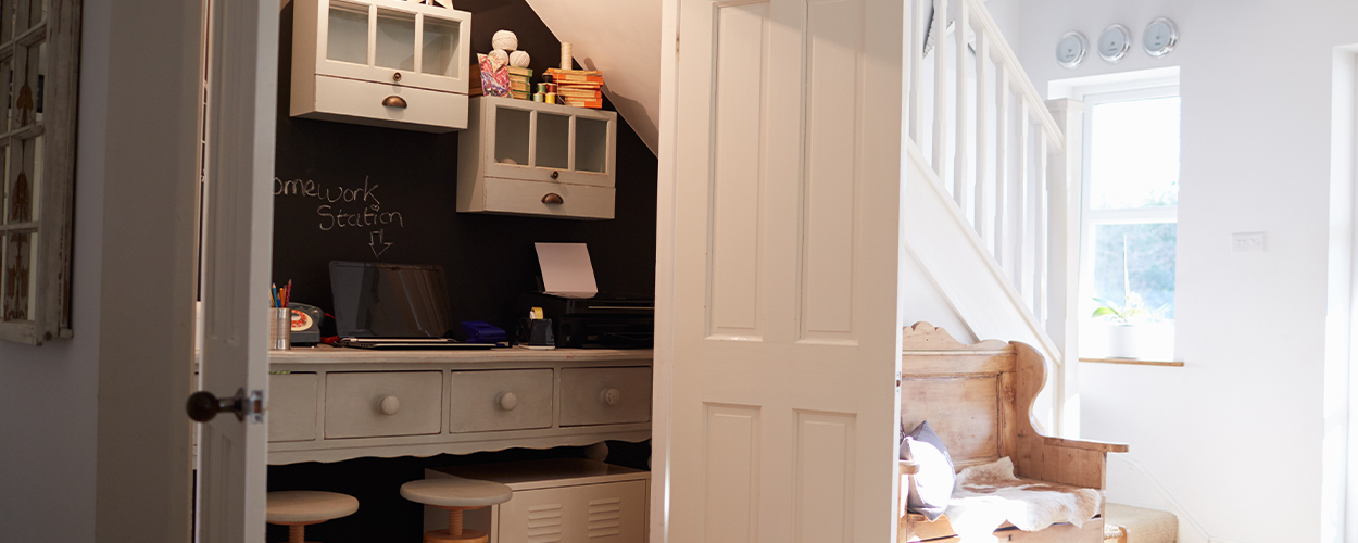 Creative home office idea underneath stairs